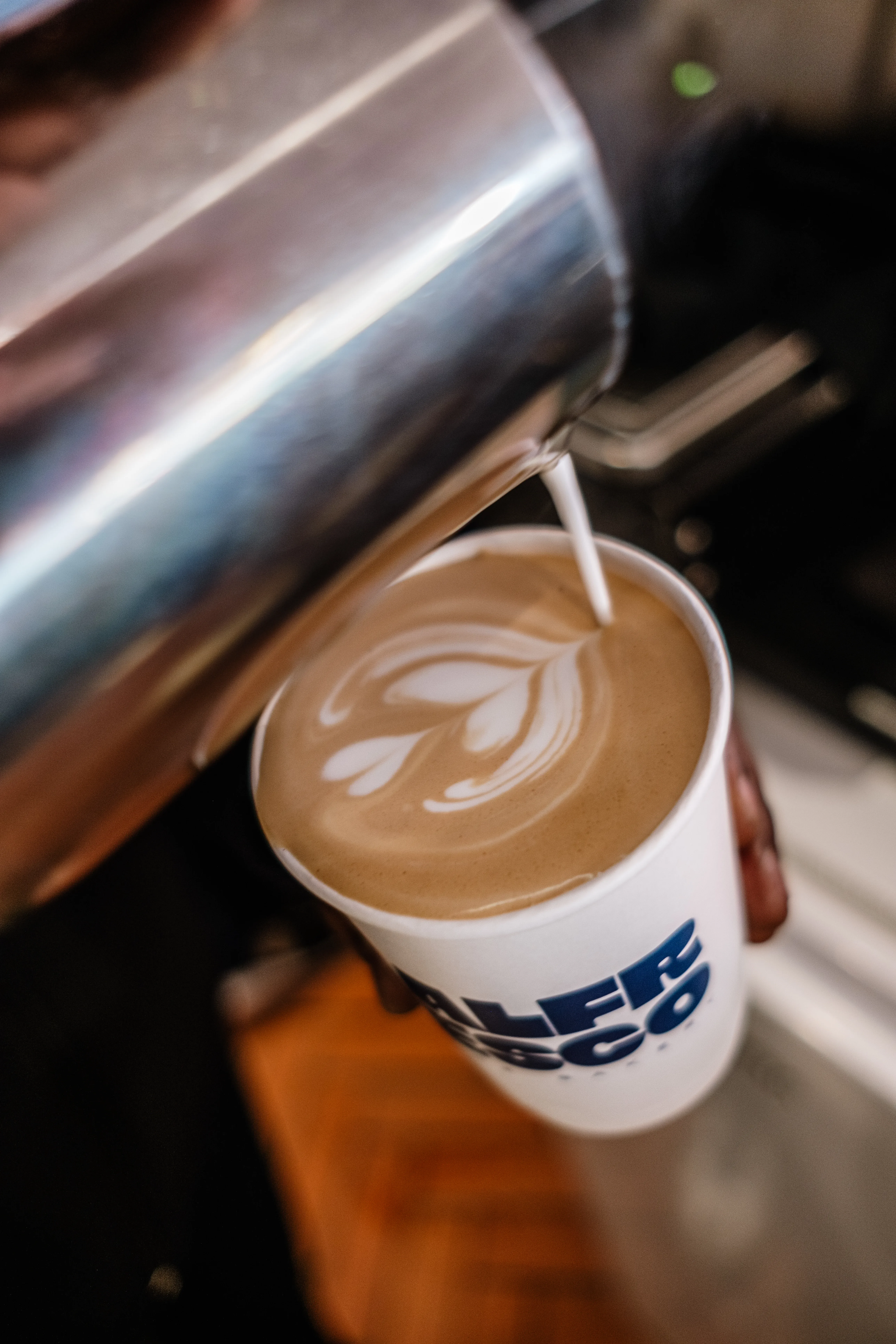Latte art with heart-shaped milk pour